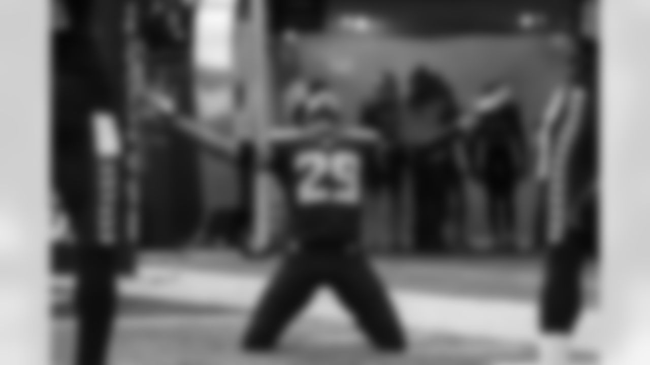 Safety Earl Thomas hits his knees in thanks and lets the roar of the 12's wash over him as he is introduced.