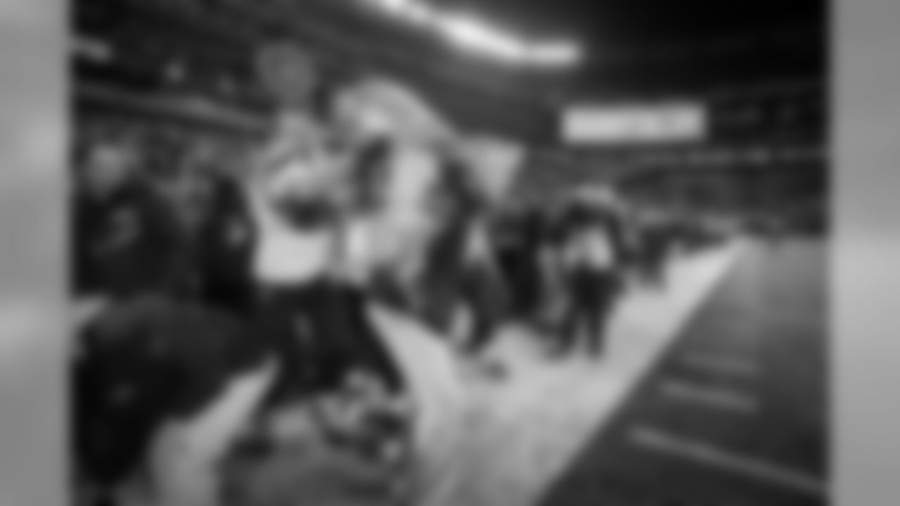 Head coach Pete Carroll gets the first drops of the traditional Gatorade bath courtesy of Zach Miller and Russell Wilson at the end of the game.