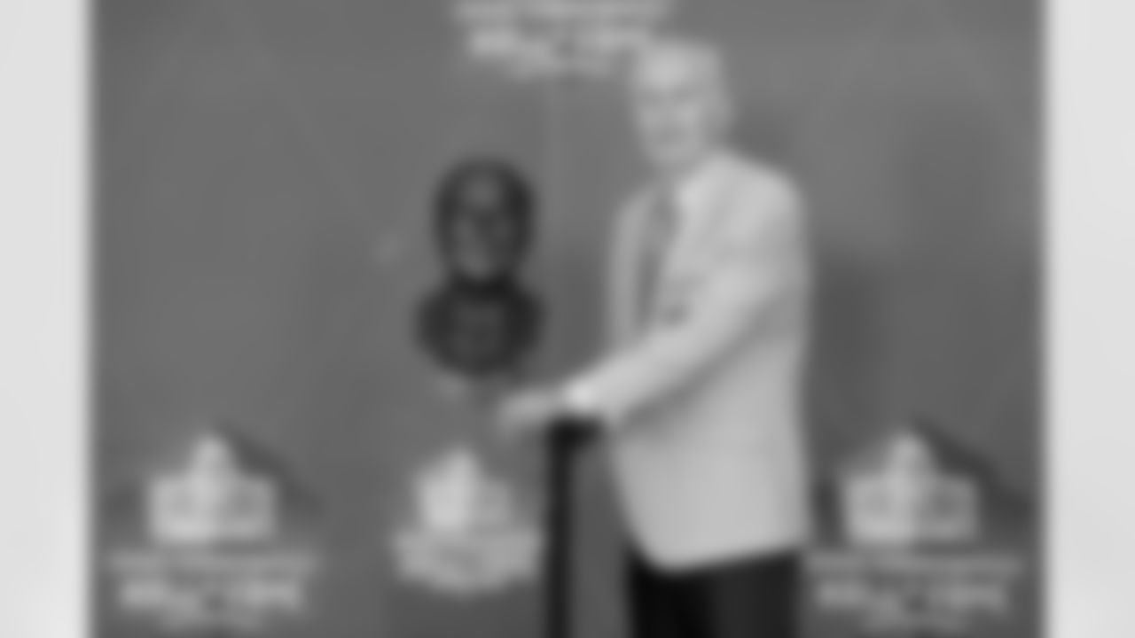 Paul Tagliabue stands with his bust during the Pro Football Hall of Fame Class of 2020 Enshrinement Ceremony on Saturday, August 7, 2021 in Canton, Ohio. (Lauren Bacho/NFL)