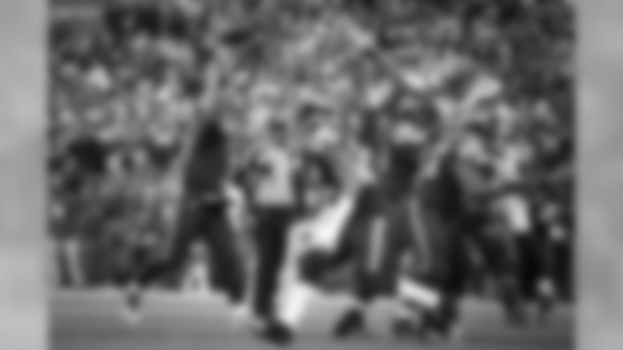 Seahawks quarterback Russell Wilson, with plenty of room to throw thanks to the protection of lineman Alvin Bailey, Justin Britt and Patrick Lewis on the left side, fires a pass to a streaking Tyler Lockett for a 27-yard touchdown.