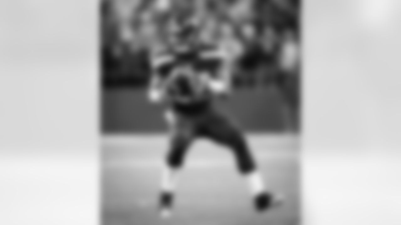 [November 20, 2005]: Seahawks 27- 49ers 25Seattle Seahawks' Rocky Bernard, top, sacks San Francisco 49ers quarterback Ken Dorsey in the fourth quarter in San Francisco on Sunday, Nov. 20, 2005. The Seahawks won 27-25. (AP Photo/Jeff Chiu)