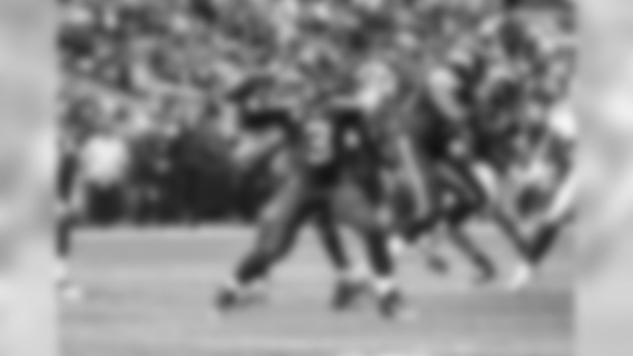 [October 1, 2006]: Bears 37 - Seahawks 6 Chicago Bears' cornerback Ricky Manning Jr., right, is knocked out of bounds by Seattle Seahawks quarterback Matt Hasselbeck, left, after intercepting a pass and returning it 39 yards during the second quarter of an NFL football game Sunday, Oct. 1, 2006 in Chicago. (AP Photo)