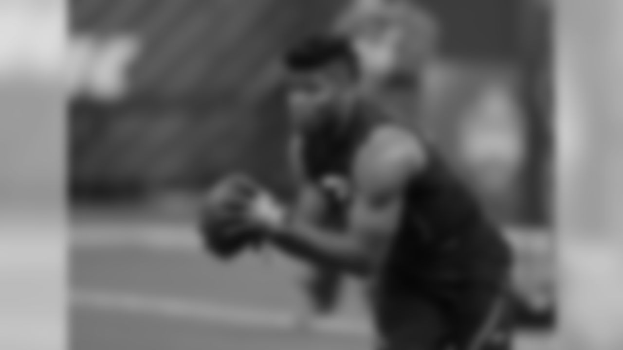 San Diego State running back Rashaad Penny runs a drill during the NFL football scouting combine, Friday, March 2, 2018, in Indianapolis. (AP Photo/Darron Cummings)