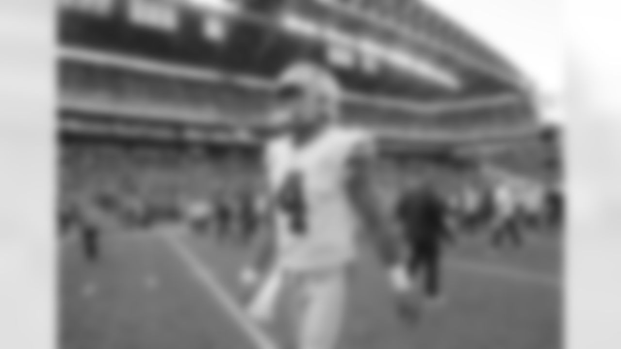 Dallas Cowboys quarterback Dak Prescott (4) walks off the field at CenturyLink Field following an NFL football game against the Seattle Seahawks, Sunday, Sept. 23, 2018, in Seattle. (AP Photo/John Froschauer)