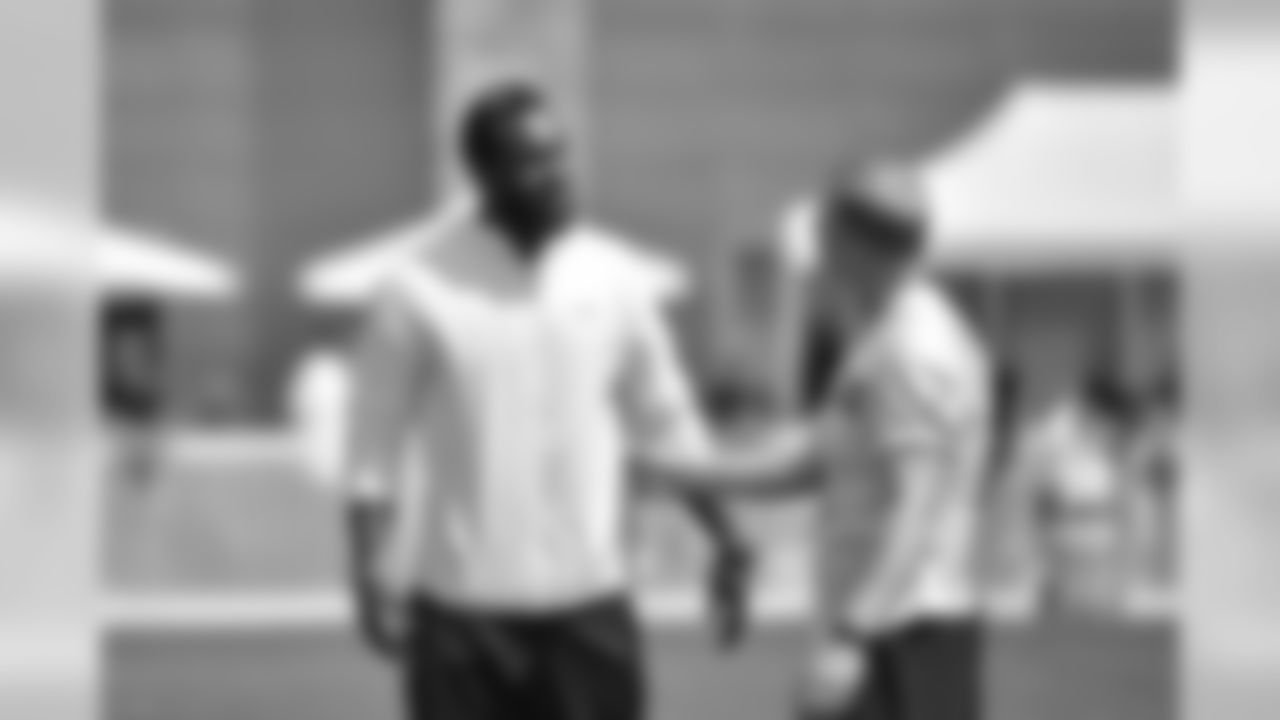 SS Kam Chancellor, left, and P Jon Ryan, right