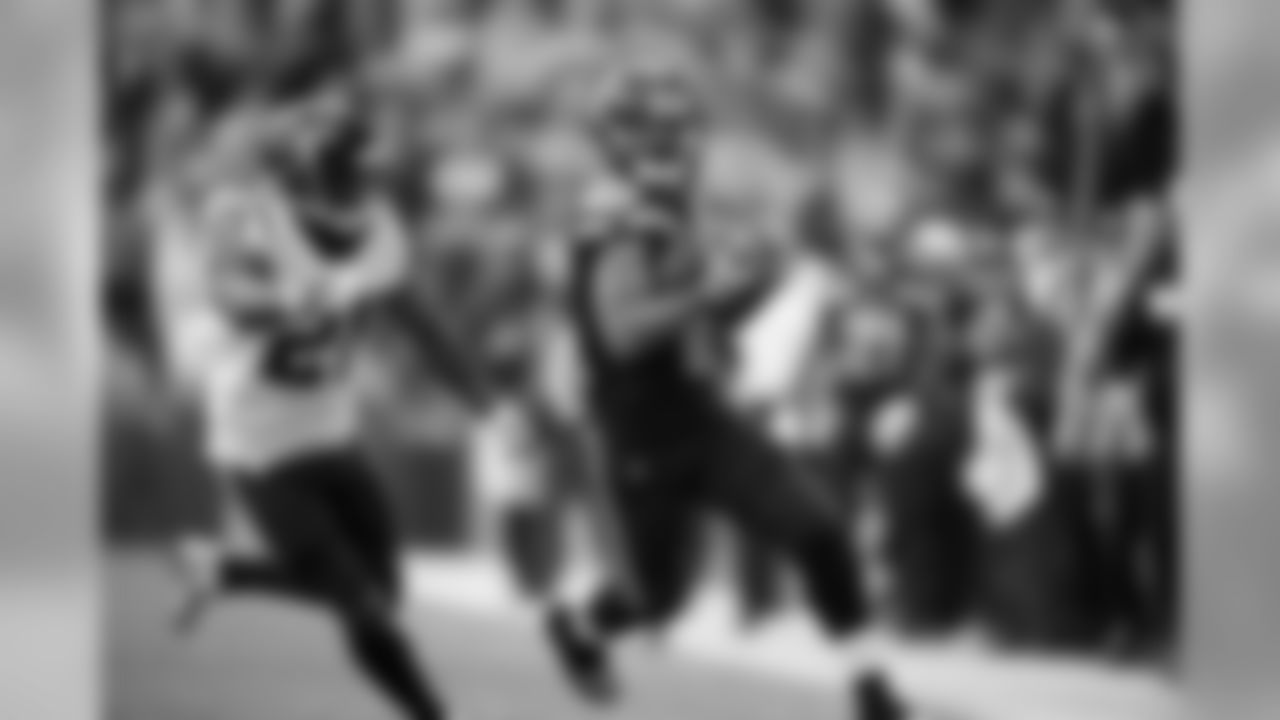 Tyler Lockett gets behind the Texans secondary for a long gain in the fourth quarter.