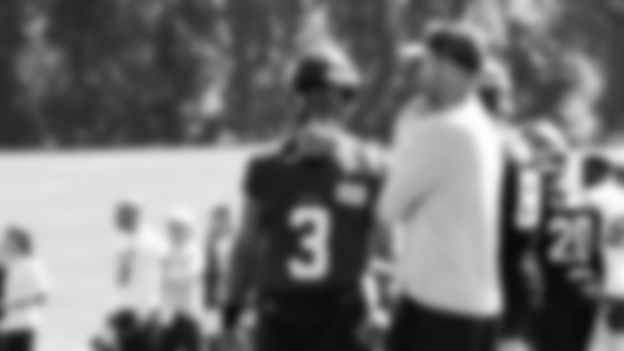 QB Russell Wilson and Offensive Coordinator Brian Schottenheimer