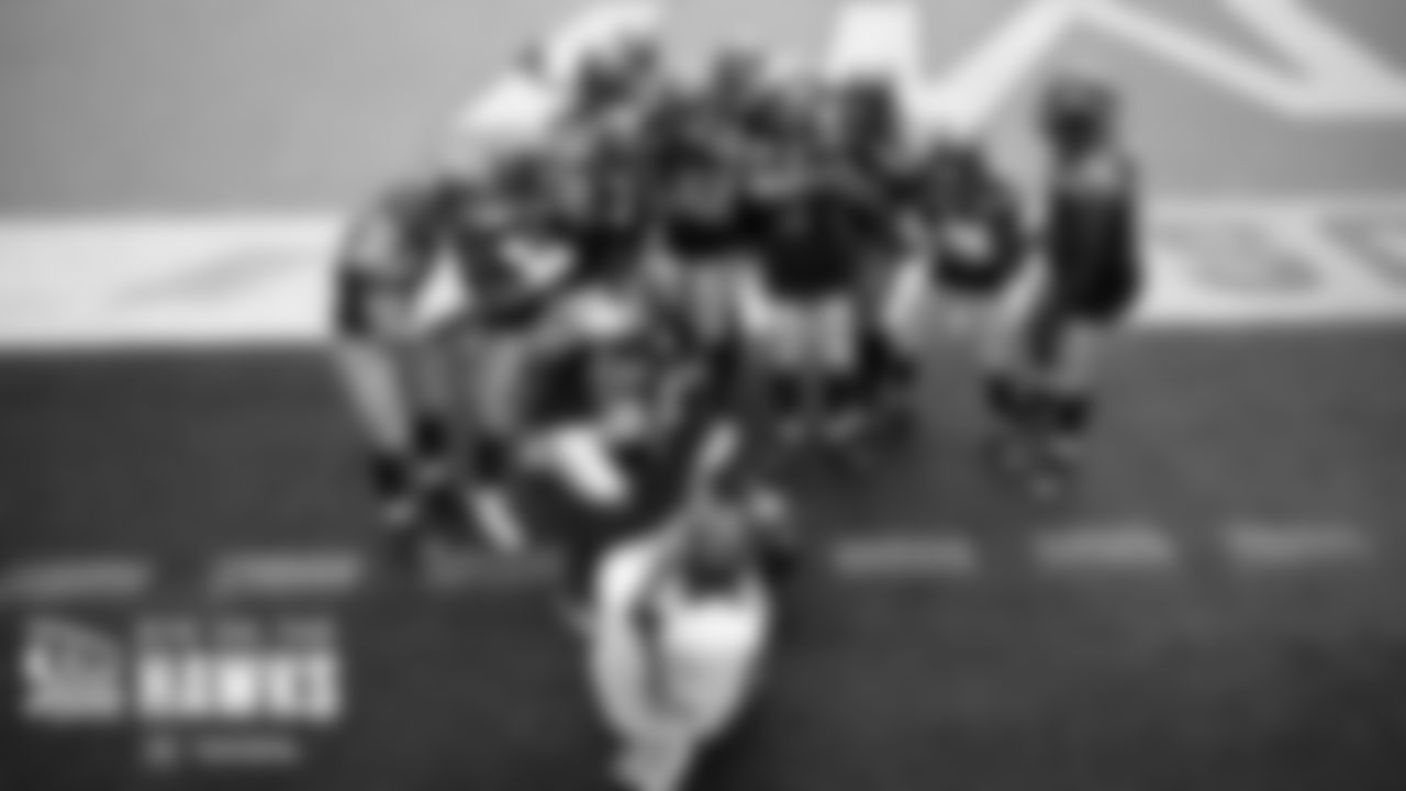 Seahawks defenders pose for a photo from team videographer/photographer Brian Pan after an interception by Shaquill Griffin.