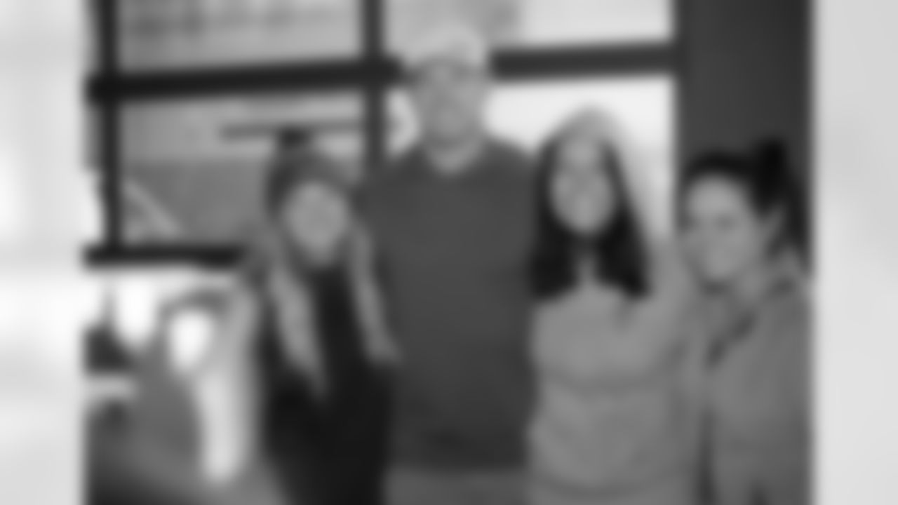 [December 9, 2007]: Seahawks 42 – Cardinals 21 Seattle Seahawks' Rocky Bernard, bottom left, trips-up Arizona Cardinals quarterback Kurt Warner (13) as Julian Peterson (59) slams into him from above during the second half of an NFL football game Sunday, Dec. 9, 2007, in Seattle. The play was ruled as a sack and the quarterback down before the ball was loose. The Seahawks won, 42-21. (AP Photo/Elaine Thompson)