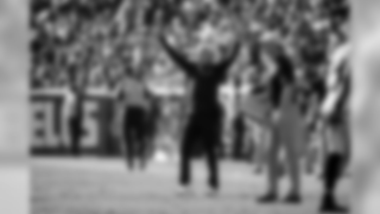 Seahawks coach Pete Carroll celebrates as his defense forced the Rams to punt late in the game.
