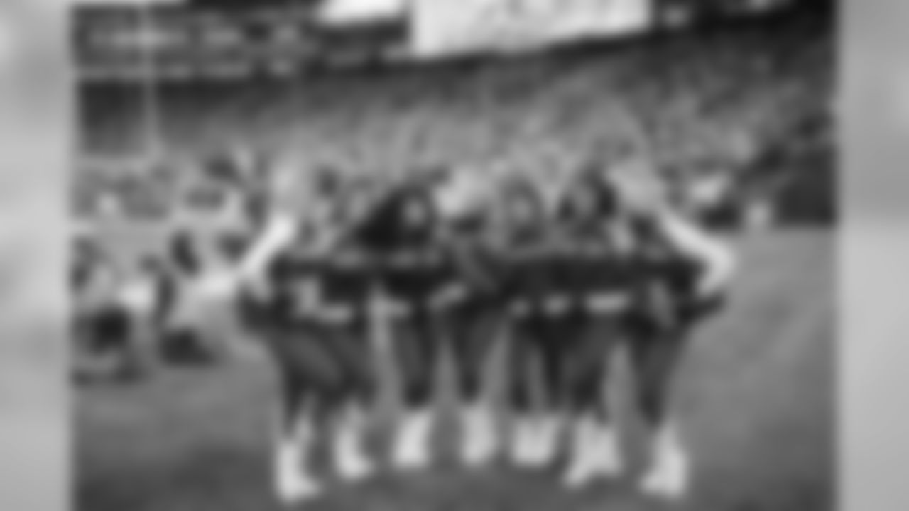 Kelsey G. and her squad posing at a break in the game.