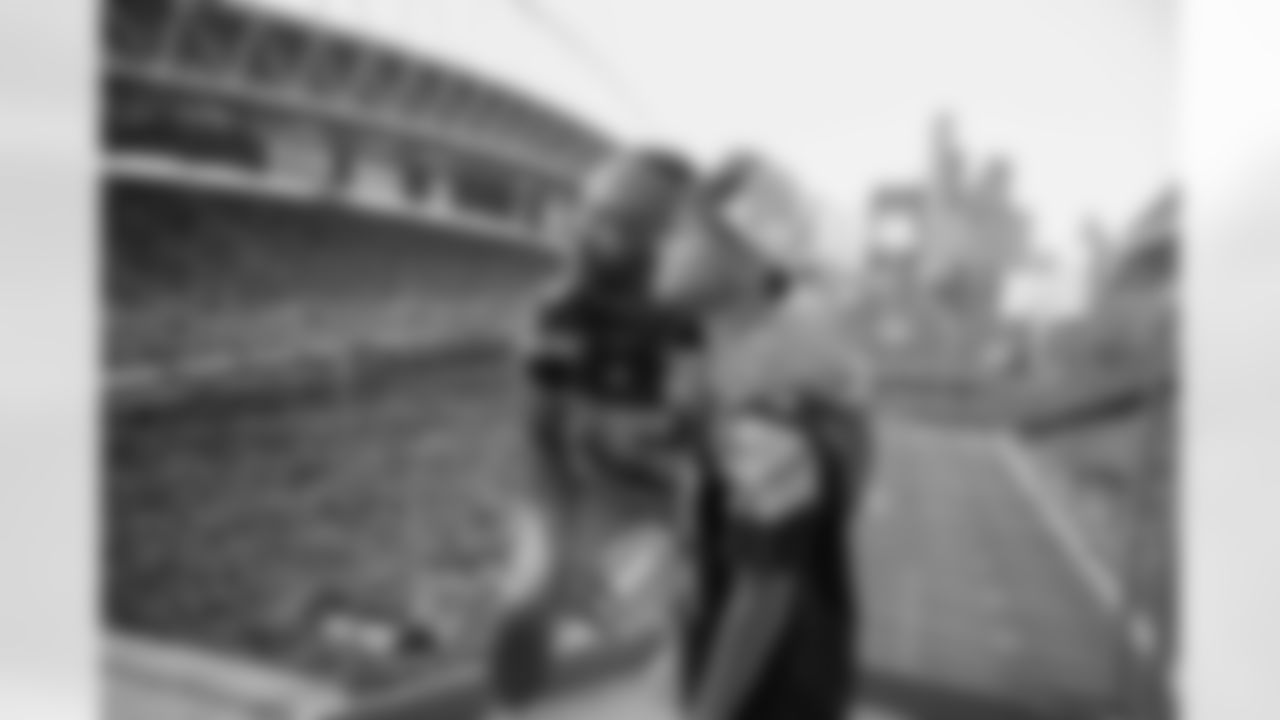 Seahawks legend Seneca Wallace raises the 12 Flag in advance of the preseason matchup vs. the Dallas Cowboys at Lumen Field on August 19, 2023.