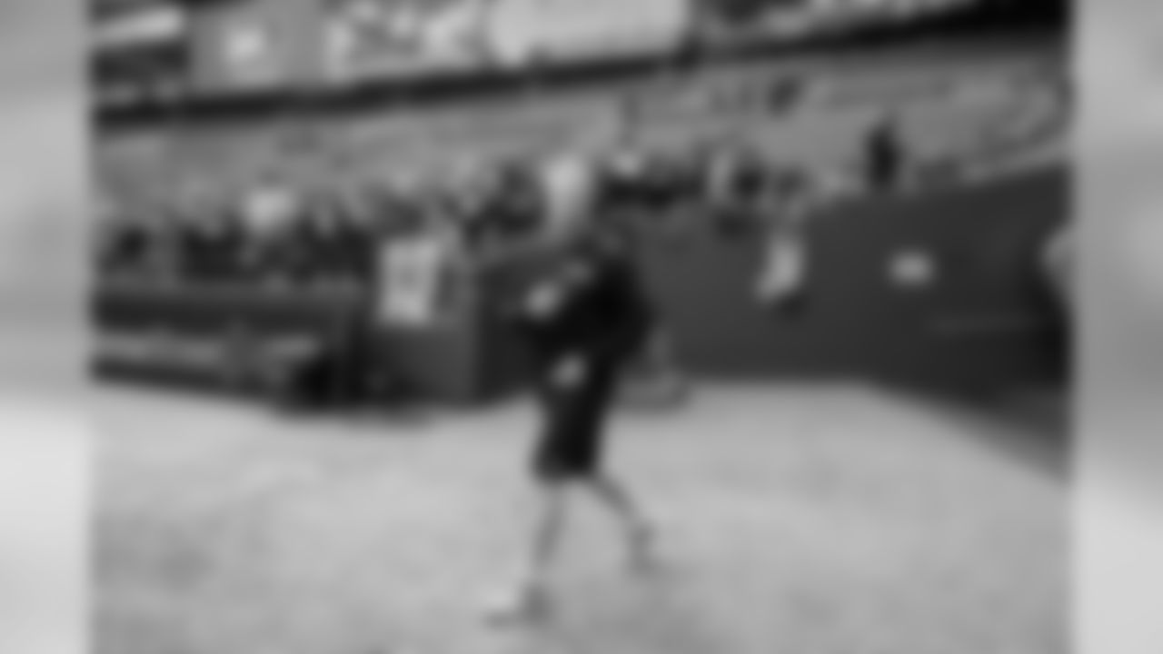 Jon Ryan, the coolest Canadian punter in the N.F.L. gives "Passes the Peace" as he walks on to the field for early warmups.