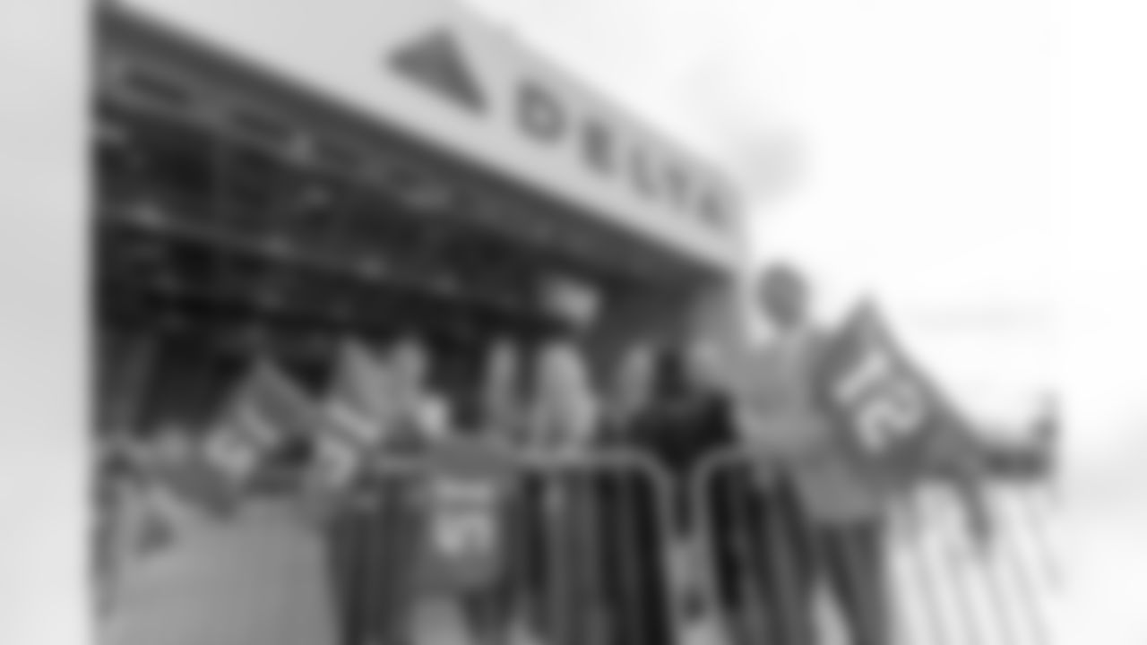 The Seattle Seahawks and Delta Air Lines present a check to the Breast Cancer Research Foundation on October 22, 2022.