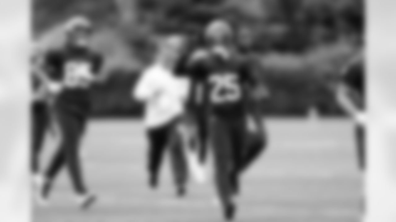 Seahawks players participate in the first OTA of the 2023 offseason on May 22 at the Virginia Mason Athletic Center in Renton, Wash.