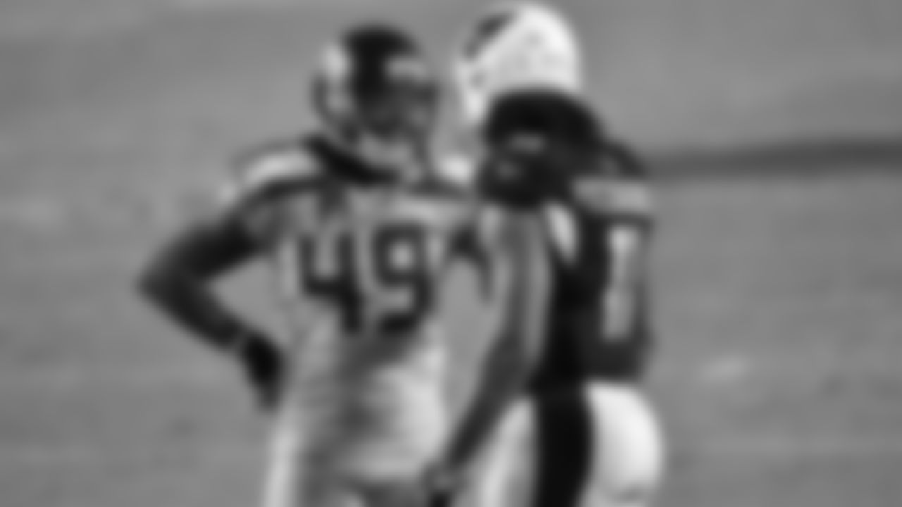 Arizona Cardinals wide receiver Larry Fitzgerald (11) talks with Seattle Seahawks outside linebacker Shaquem Griffin (49) during an NFL football game against the Seattle Seahawks on Sunday, October 25, 2020 in Glendale, Arizona. (Alika Jenner/NFL)