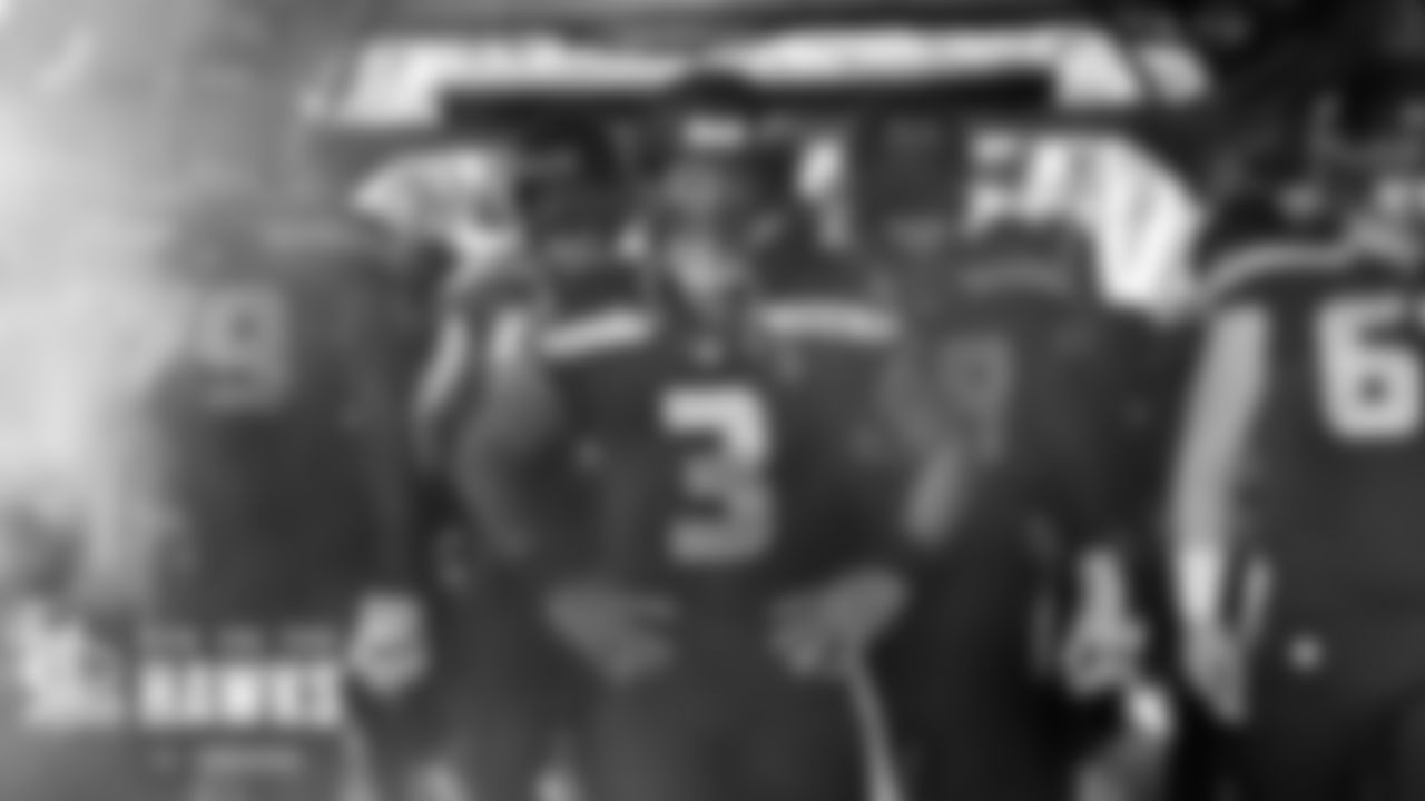Seahawks quarterback Russell Wilson stands ready to lead the team onto the field.