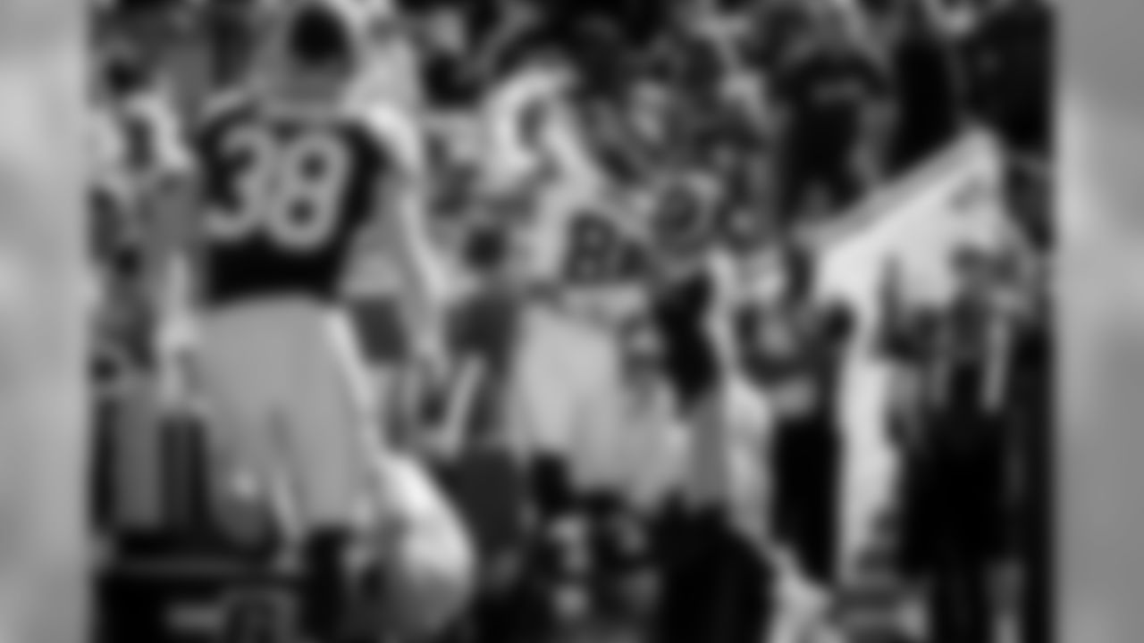 Seattle's Jimmy Graham outlaws the smaller John Johnson III of the Rams for a touchdown reception.