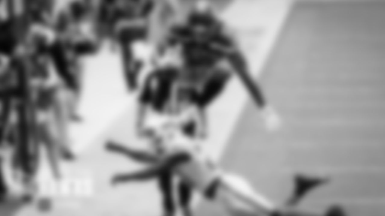 One play after teammate David Moore leapt over would-be tackler, running back Chris Carson hurdled a Dolphins defender along the same sideline.