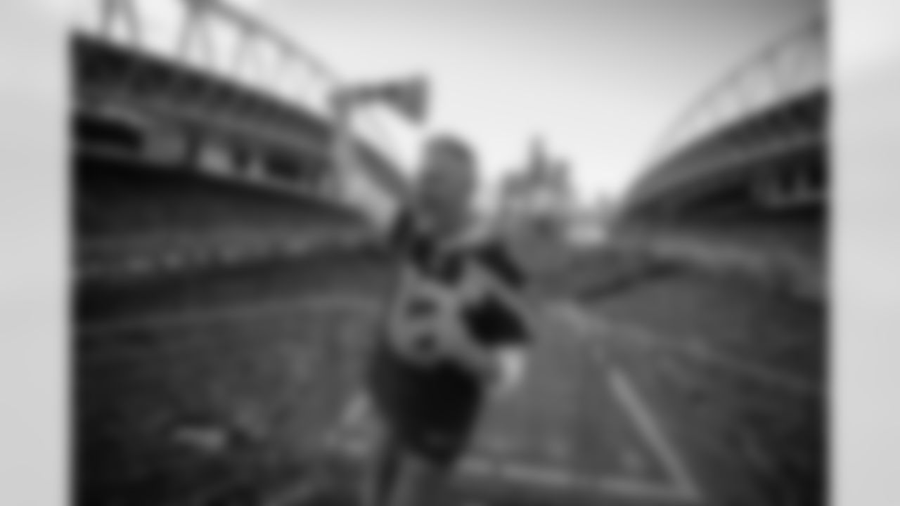 TV personality Ross Mathews raised the 12 flag ahead of the Seahawks preseason opener against the Minnesota Vikings on Thursday, August 10, 2023 at Lumen Field in Seattle, Wash.