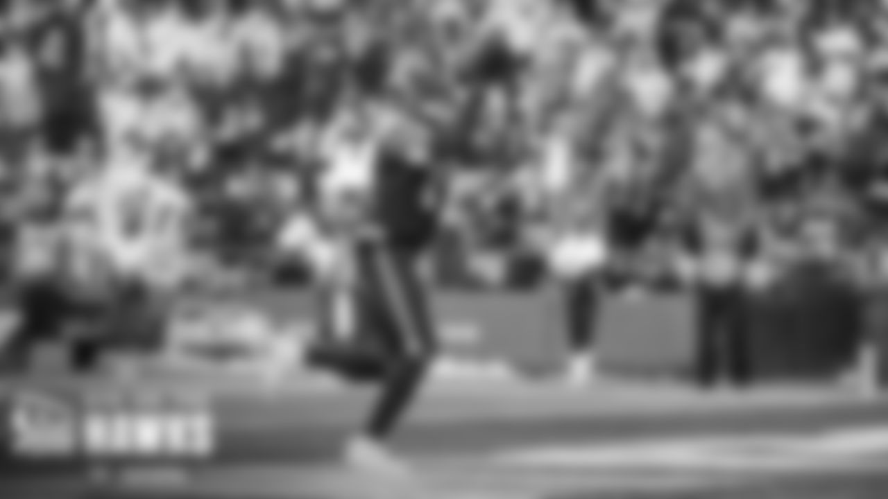 Seahawks receiver DK Metcalf hauls in a 13-yard pass from Russell Wilson, the first of his three touchdowns on the day.