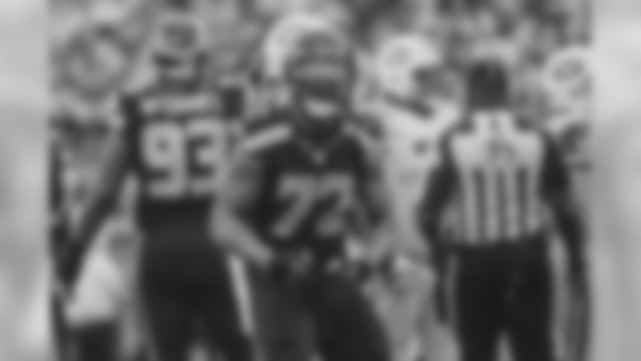 Michael Bennett strikes a pose after sacking Jet's quarterback Ryan Fitzpatrick.
