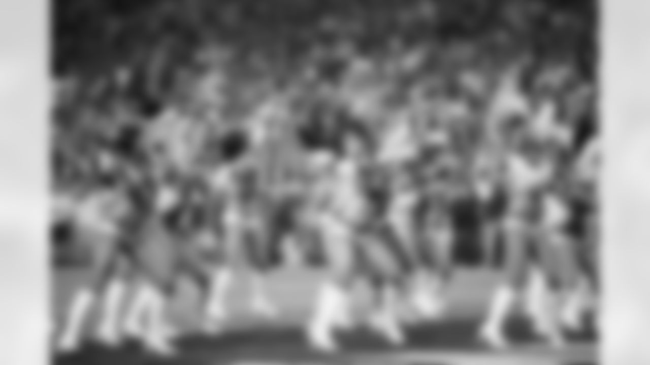 [January 8, 2005]: Rams 27 – Seahawks 20 (NFC Wild Card Game)Seattle Seahawks defenders Kris Richard, left, and Ken Lucas, right, break up a pass intended for St. Louis Rams' Torry Holt in the third quarter of their NFC wild-card playoff game in Seattle, Saturday, Jan. 8, 2005. (AP Photo/Ted S. Warren)