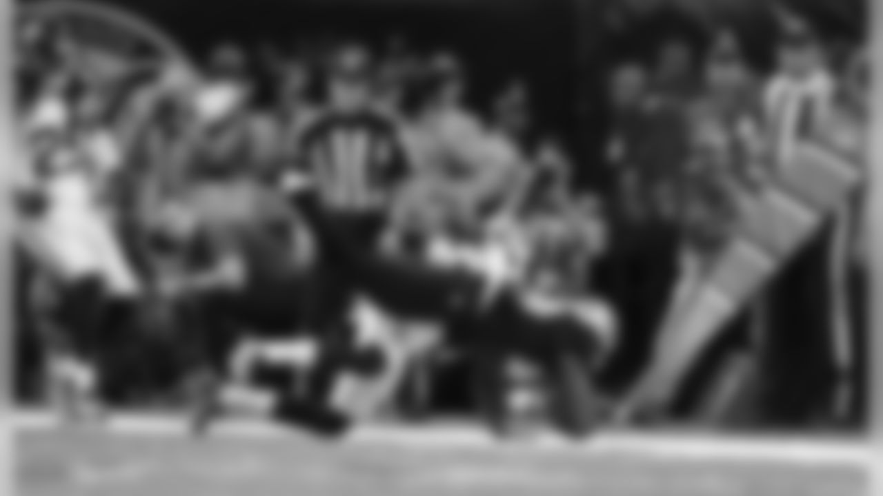 Seahawks safety Kelcie McCray hauls New Orleans running back Tim Hightower out-of-bounds hoping to stop the clock on the Saints' final drive. However, officials ruled Hightower inbounds and the Seahawks were forced to use their final timeout.