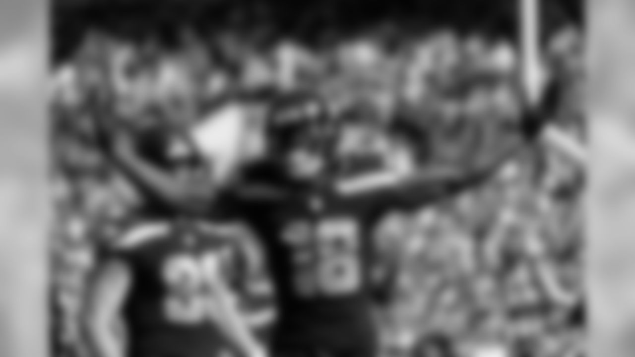 Receiver Jaron Brown celebrates after his touchdown catch.