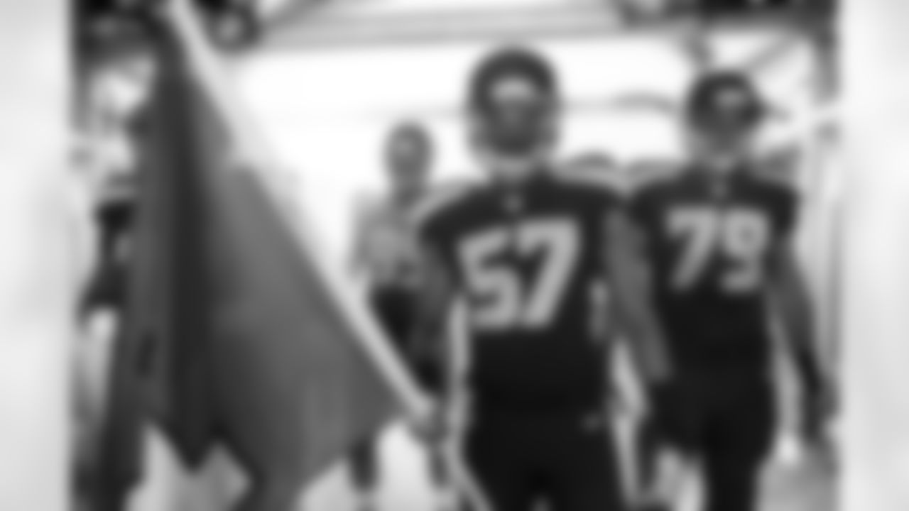 Linebacker Mike Morgan has been entrusted with the job of carrying the 12 Flag onto the field in the absence of Heath Farwell, who used to have the duty.