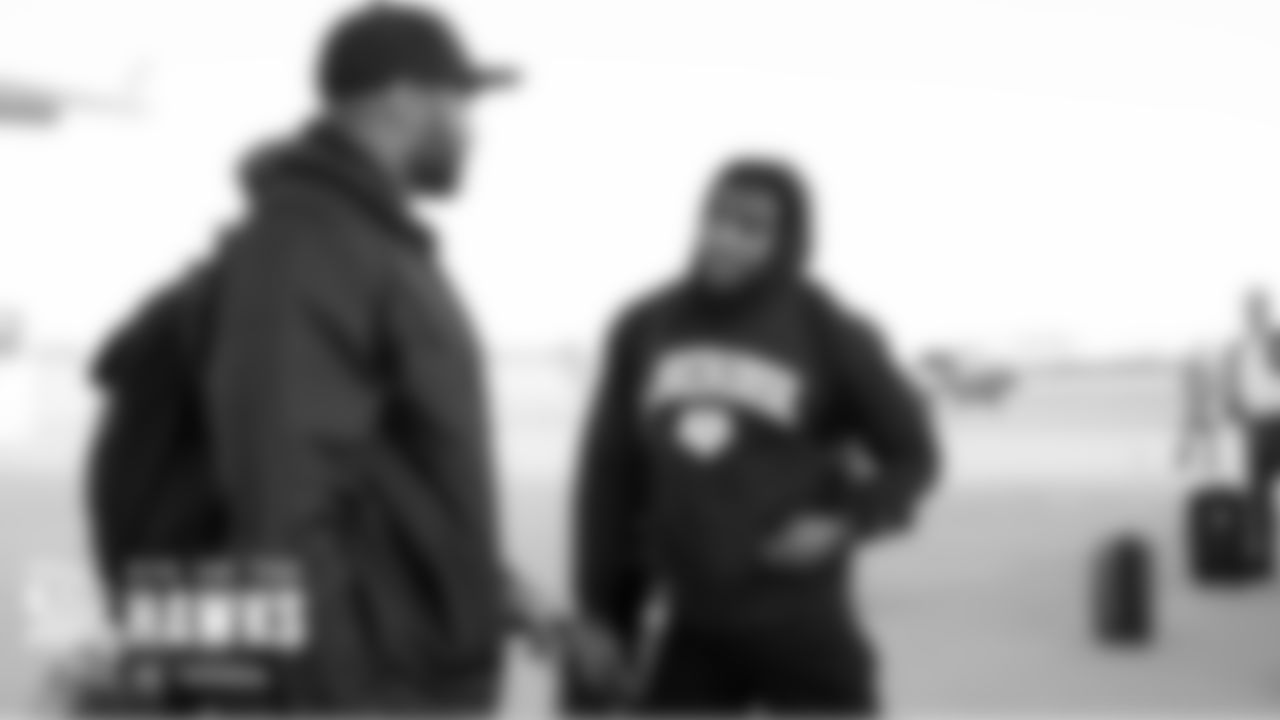Linebackers Bobby Wagner and K.J. Wright talk about the game on the tarmac before boarding for the flight back to Seattle.