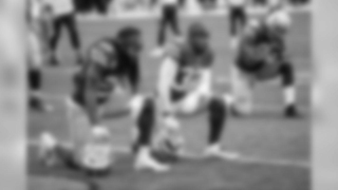 San Francisco 49ers cornerback Richard Sherman (25) and 49ers rookie free safety D.J. Reed Jr. (32) take a knee in support of an injured teammate in the first quarter during the NFL week 15 regular season football game against the Seattle Seahawks on Sunday, Dec. 16, 2018 in Santa Clara, Calif. The 49ers won the game 26-23 in overtime. (Paul Spinelli via AP)