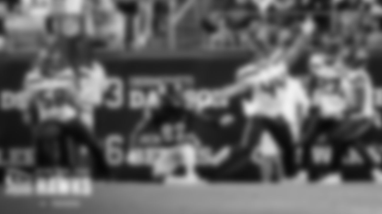 Seahawks linebacker Nick Bellore breaks up a pass, bats it in the air and tries to recover the ball in the air.