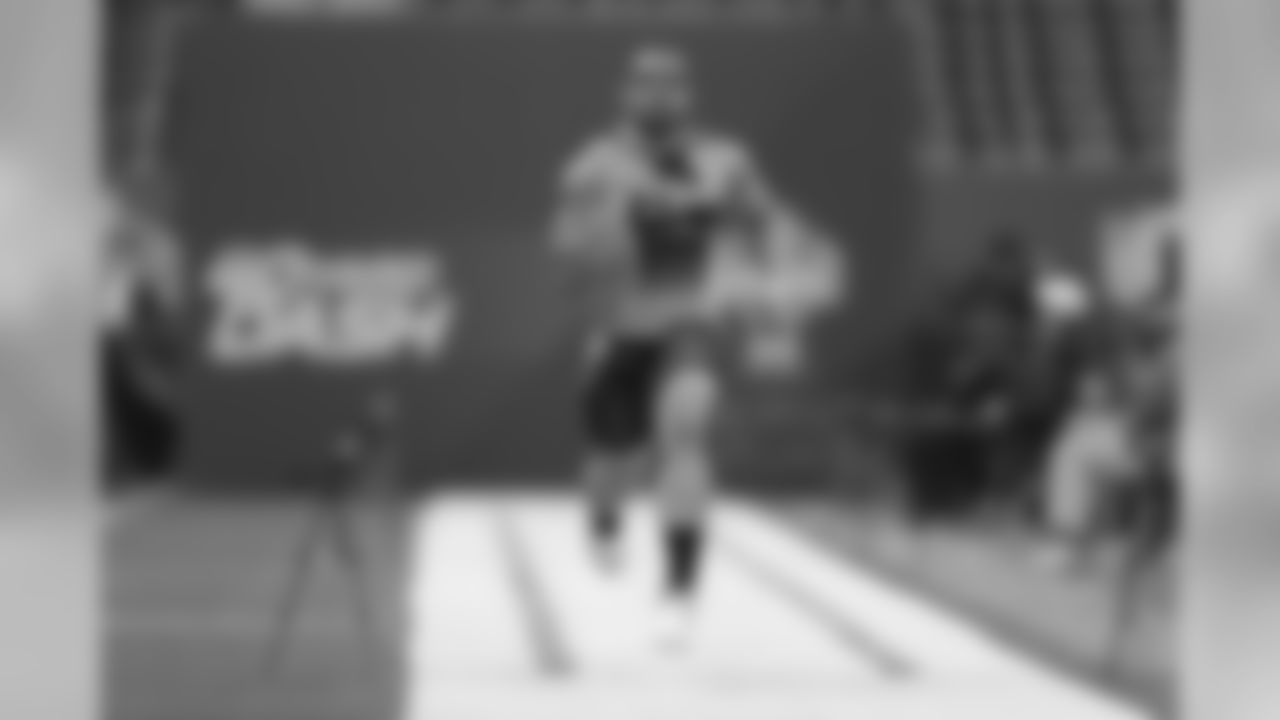 Central Michigan Thomas Rawls runs the 40-yard dash at the NFL football scouting combine in Indianapolis, Saturday, Feb. 21, 2015. (AP Photo/David J. Phillip)