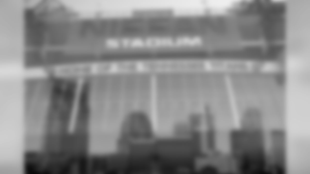 Downtown Nashville skyscrapers are reflected in the glass of the Nissan Stadium facade in this double exposure photograph taken before the Tennessee Titans 2016 NFL week 7 regular season football game against the Indianapolis Colts on Sunday, Oct. 23, 2016 in Nashville, Tenn. The Colts won the game 34-26. (Paul Spinelli via AP)