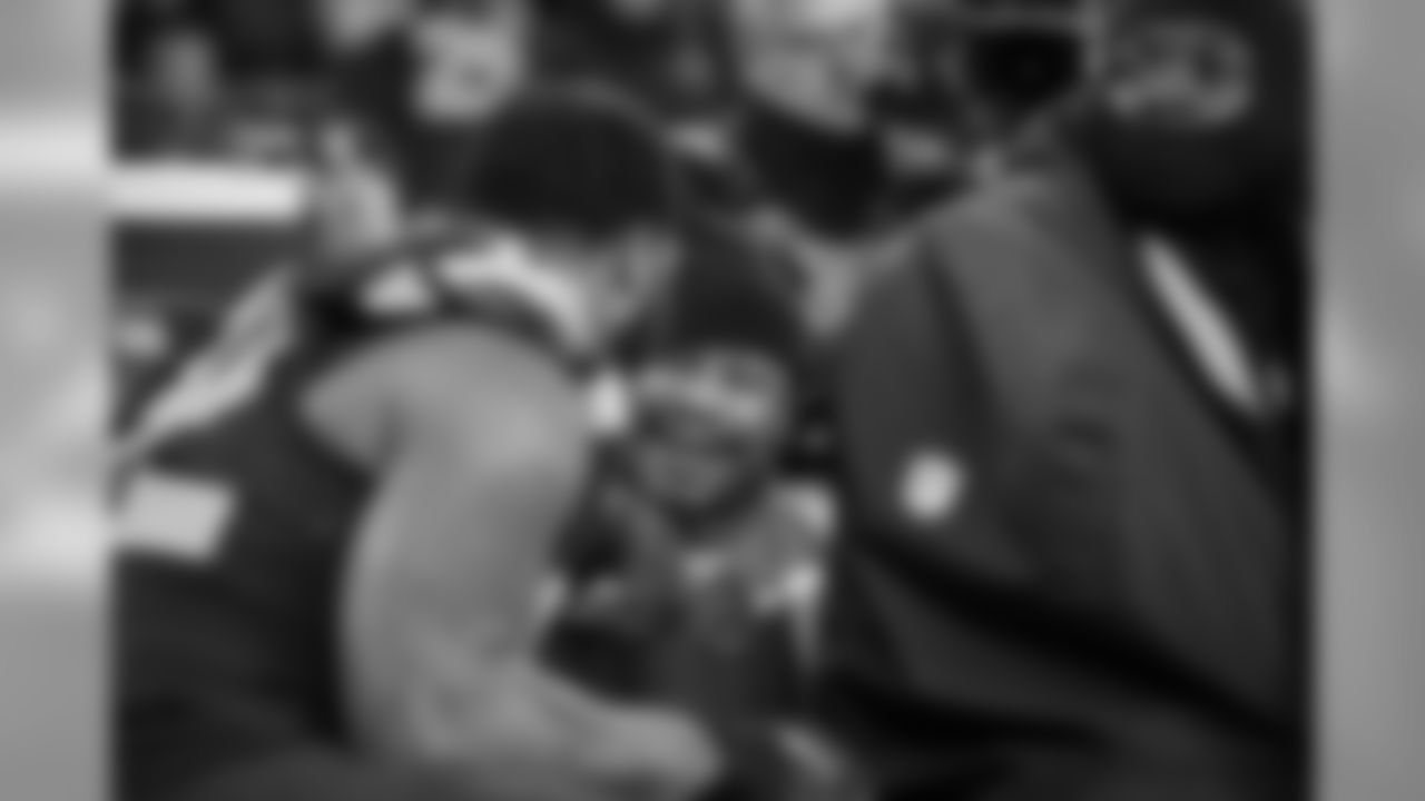 Between quarters, former Seahawks running back Marshawn Lynch was spotted talking to teammates on the sidelines including Michael Bennett.