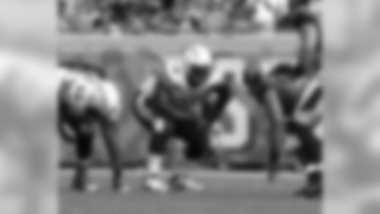San Diego Chargers' rookie right tackle D.J. Fluker (76) lines up before the snap during a game against the Jacksonville Jaguars at EverBank Field in Jacksonville, Florida, Sunday, October 20, 2013. (AP Photo/Chris Covatta)