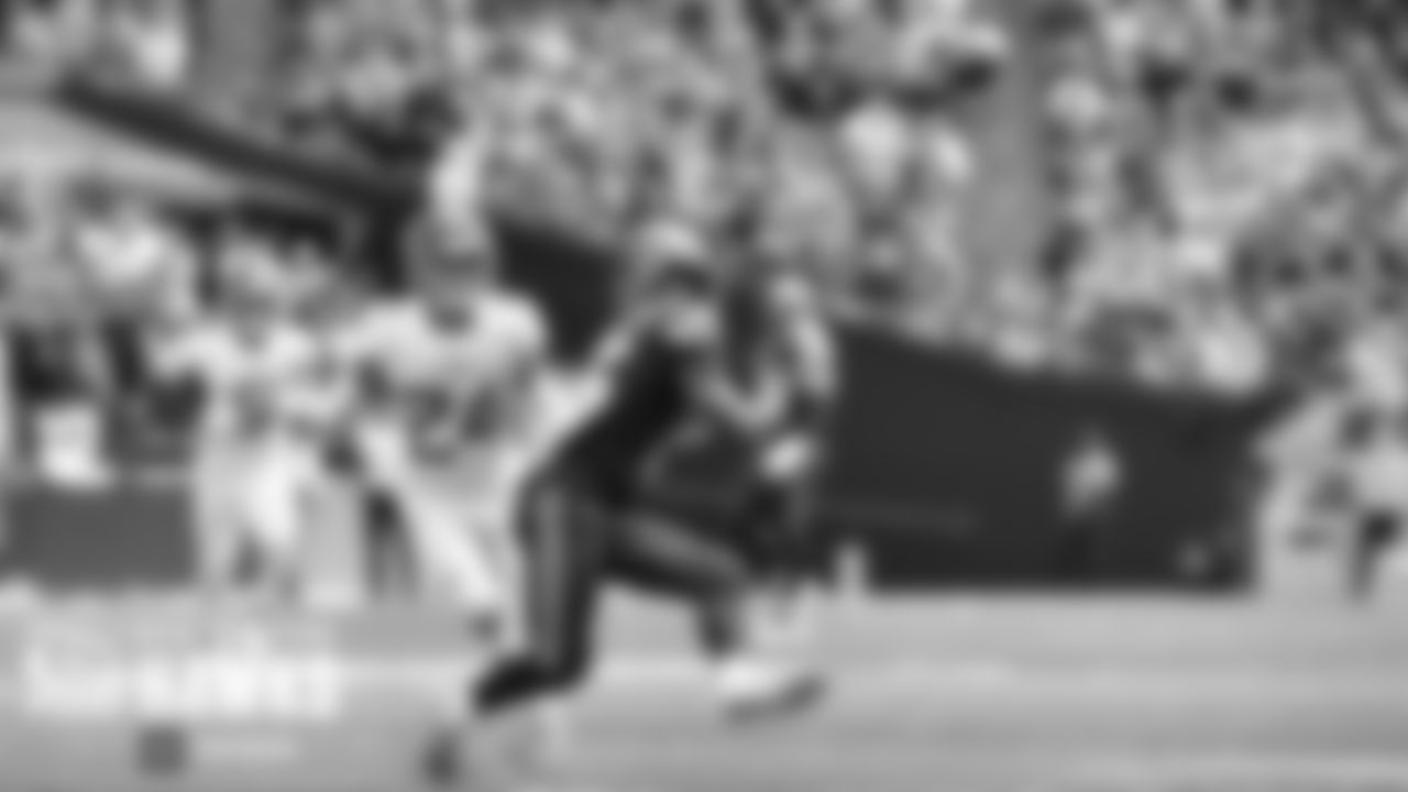 Seahawks receiver Tyler Lockett gets behind the Titans defense for a long reception, after which he split two defenders on his way to a touchdown.