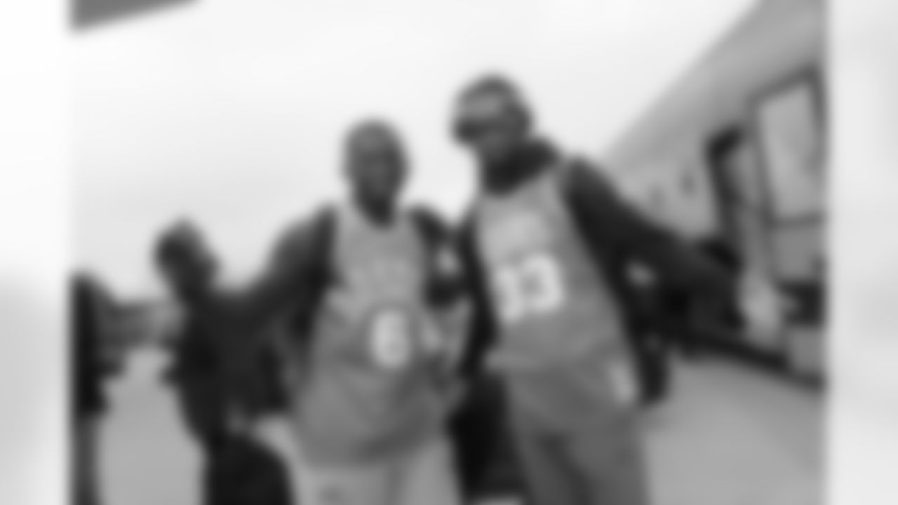 Kevin Pierre-Louis and Tyvis Powell sport Celtics basketball jerseys for the trip to Boston. Pierre-Louis has repped a basketball team from the opposing city for each road trip.