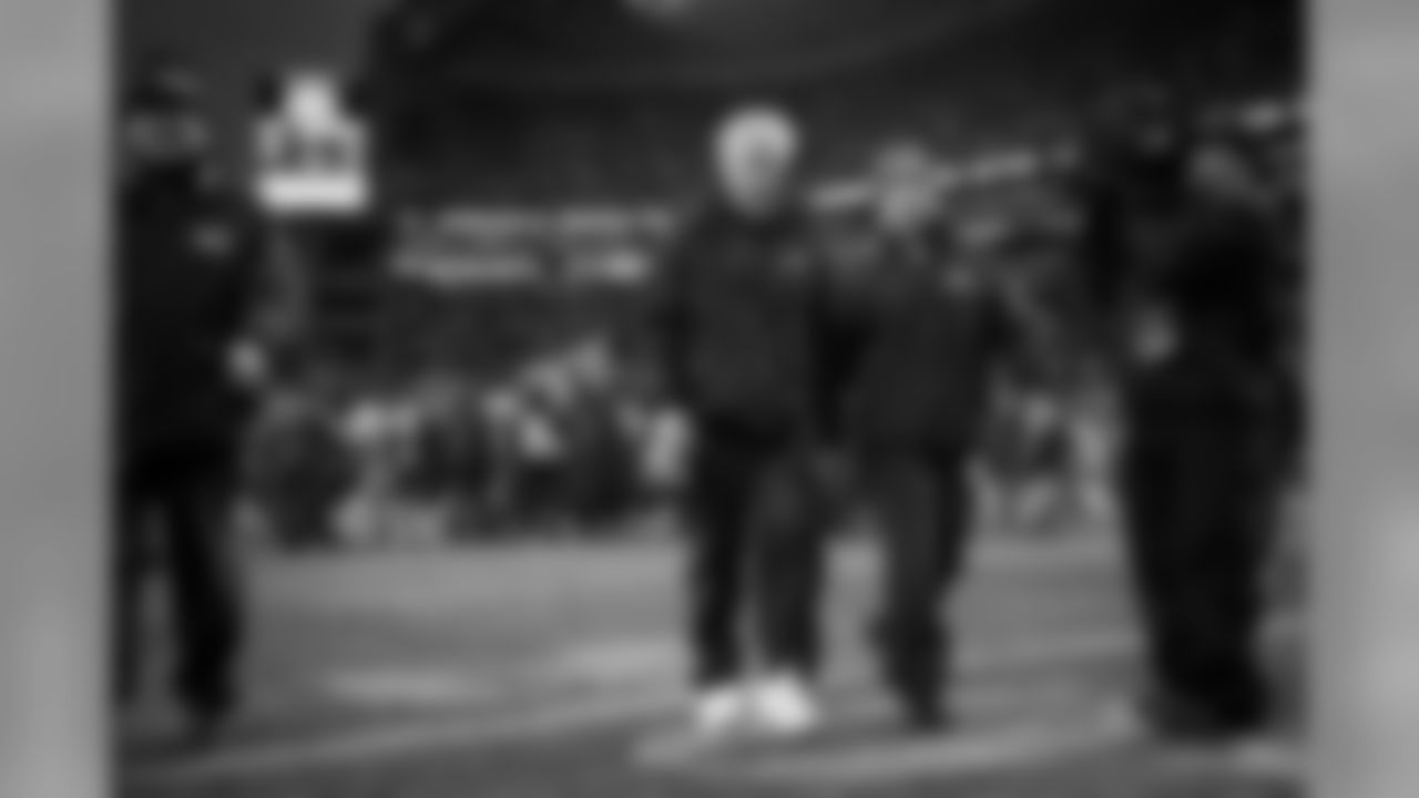Head coach Pete Carroll walks to the locker room after the game.