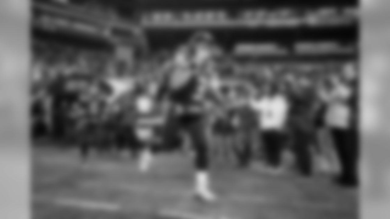 Quarterback Russell Wilson enters the field for pregame warmups.