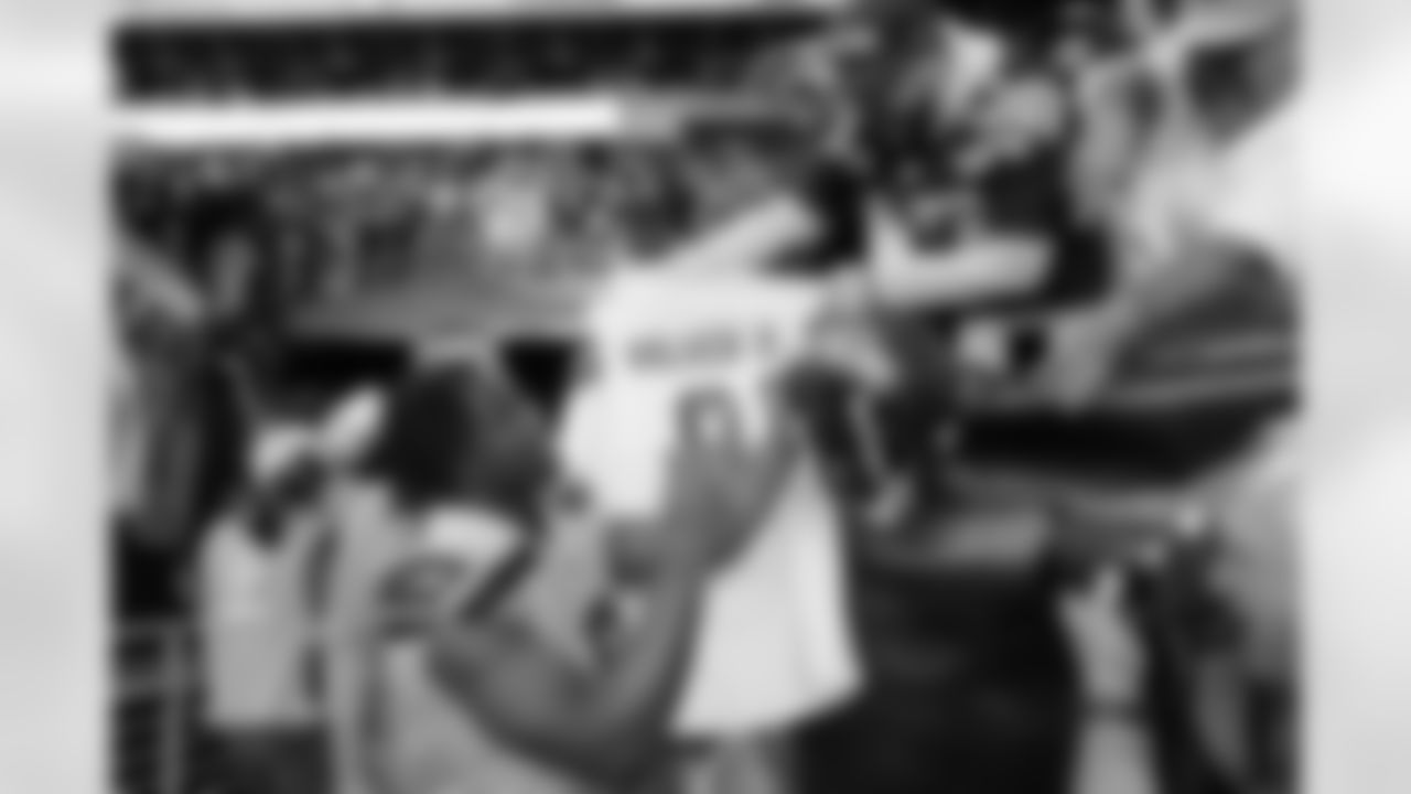Seattle Seahawks running back Kenneth Walker III (9) signs autographs after an NFL football game against the Arizona Cardinals in Glendale, Ariz., Sunday, Nov. 6, 2022. (AP Photo/Matt York)
