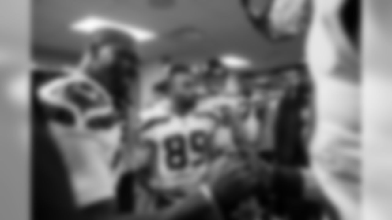 Receiver Doug Baldwin speaks to the team and Jeremy Lane shakes hands with a teammate before the team left the locker room prior to kickoff.