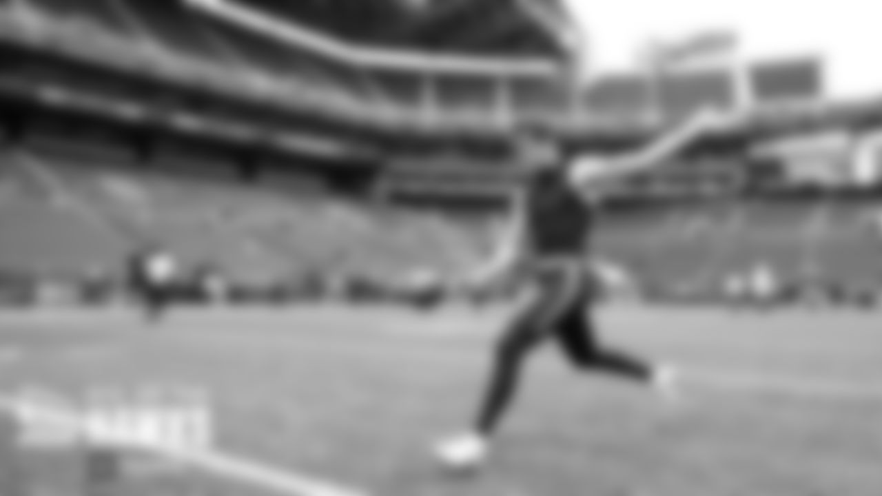 Punter Michael Dickson gets some early work before the teams take the field for pregame warmups.