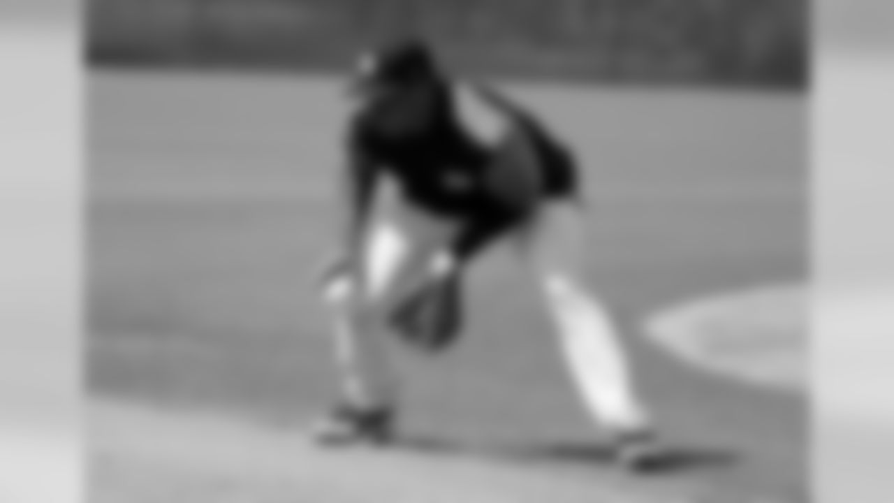 Seattle Seahawks NFL football team quarterback Russell Wilson does drills at New York Yankees baseball spring training camp, Monday, Feb. 26, 2018, in Tampa, Fla. (AP Photo/Lynne Sladky)