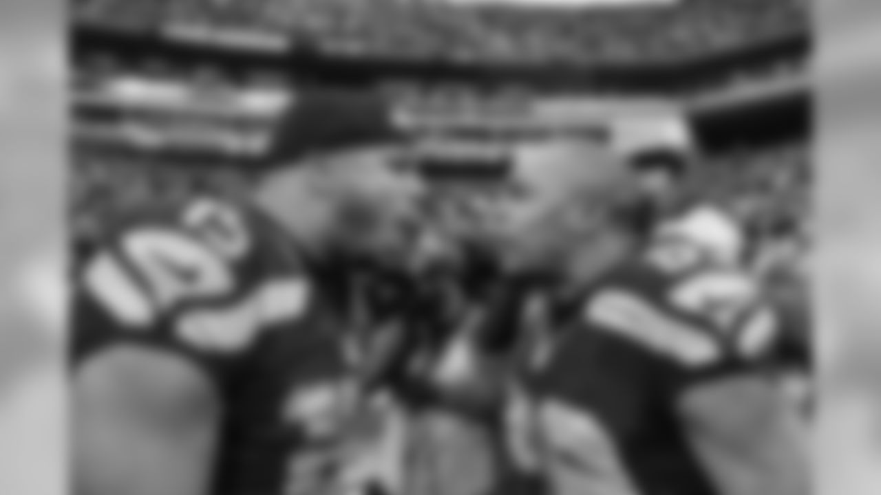 Seahawks receivers Jermaine Kearse and Doug Baldwin shout just moments after Kearse's 35-yard game-winning touchdown catch in overtime. Both Kearse and Baldwin had tough afternoons (Kearse targeted four times, all resulting in interceptions and Baldwin with a fumble and a drop) before each had big receptions in the final drive.