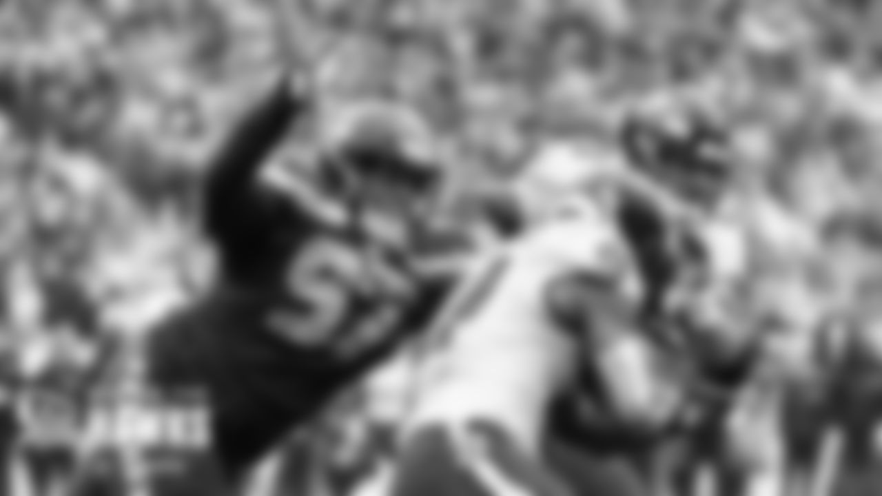 Seahawks defensive tackle Poona Ford tackle Ravens running back Mark Ingram.