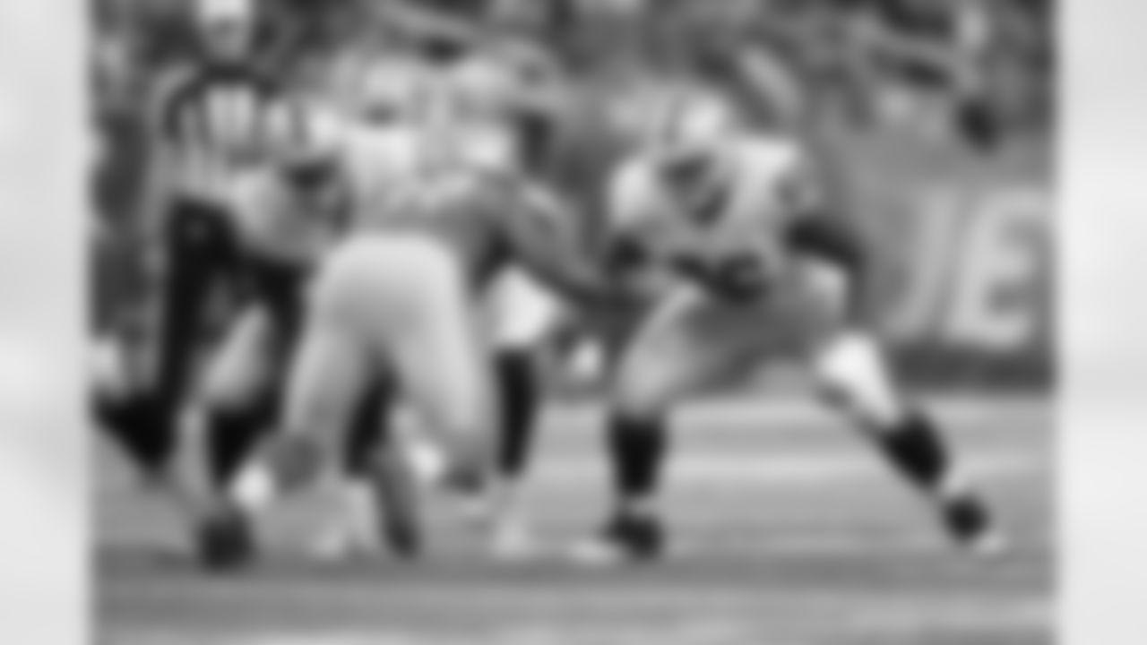 Detroit Lions defensive tackle Caraun Reid (97) rushes on Oakland Raiders guard Gabe Jackson (66) during an NFL football game at Ford Field in Detroit, Sunday, Nov. 22, 2015. (AP Photo/Rick Osentoski)
