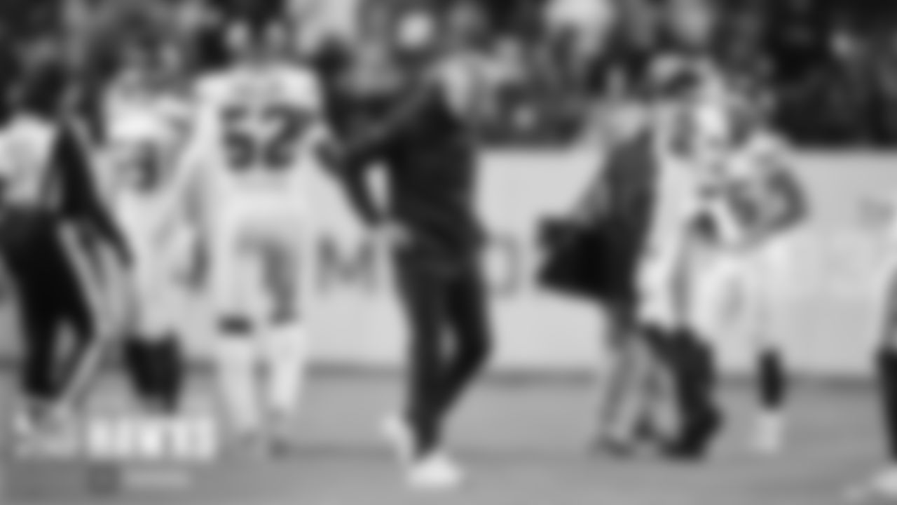 Head coach Pete Carroll heads back to the sideline after Washington recovered Seattle's onside kick attempt in the final minutes.