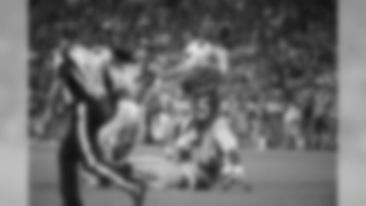 The Cardinals inserted backup quarterback Drew Stanton into the game in the second half, and Seattle's Michael Bennett pulled him down by the jersey resulting in an incomplete pass.